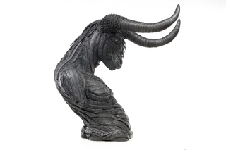 Illustration for article titled This Artist Turns Old Tires Into Dark, Disturbing Nightmare Monsters